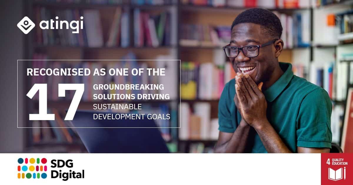 Student looking at his laptop smiling. Writing on the image indicates atingi being a groundbeaking solution to help achieve the Sustainable Development Goals.