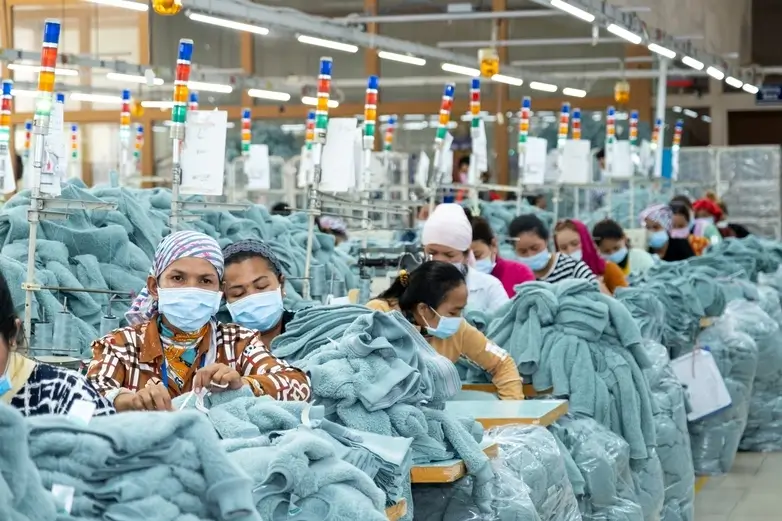 Workers in a fabric factory.