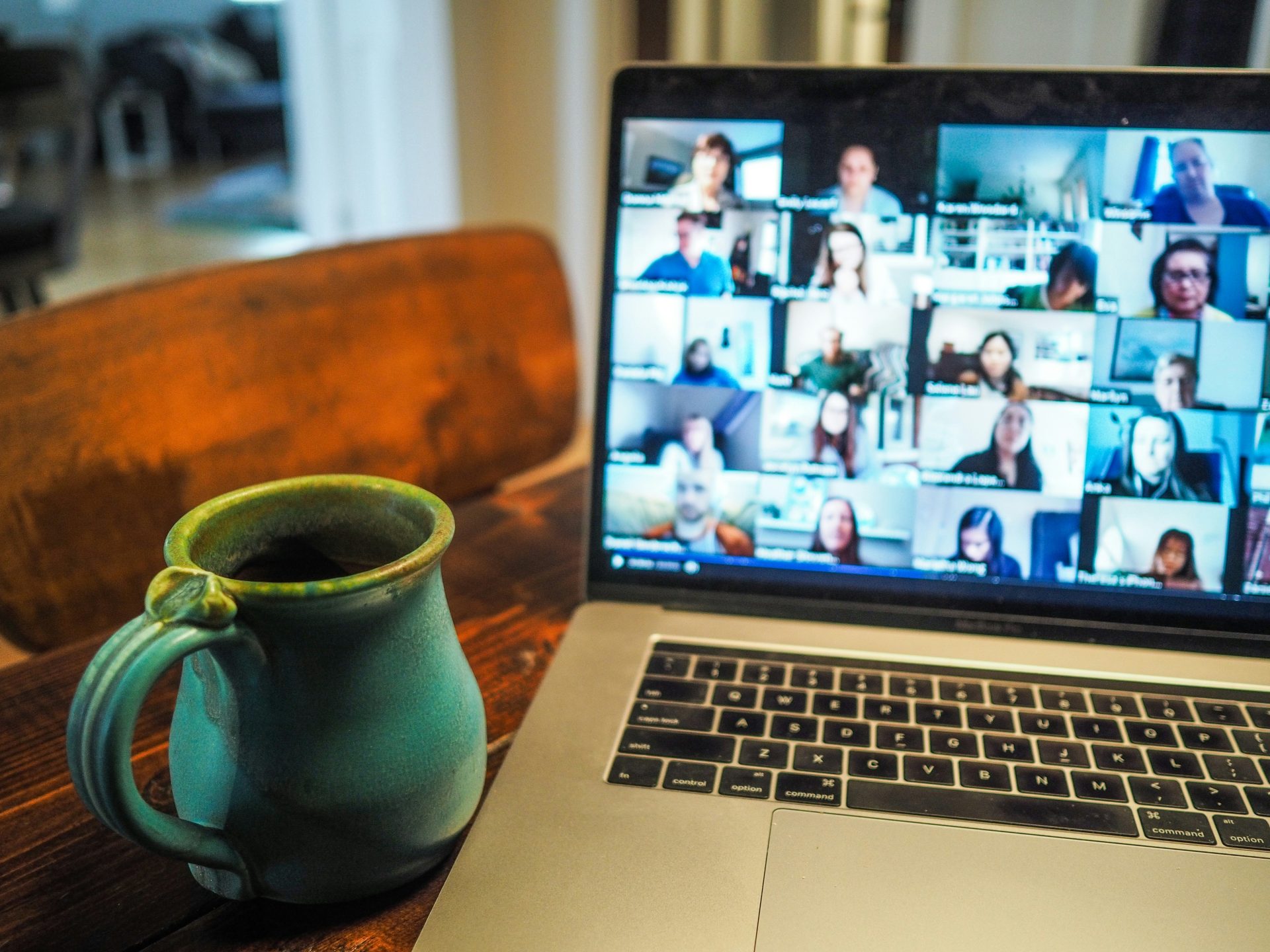 Open laptop screen with a video conference taking place