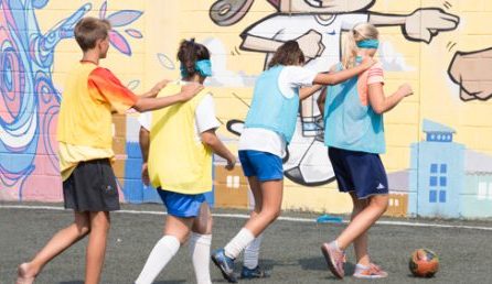 Four young people during a sports game