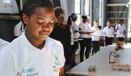 Young women and men lined up during a training sessions