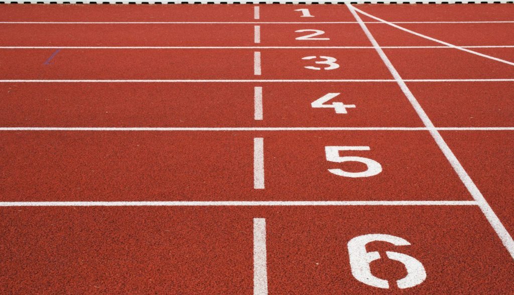 Close up of the beginning of a running track